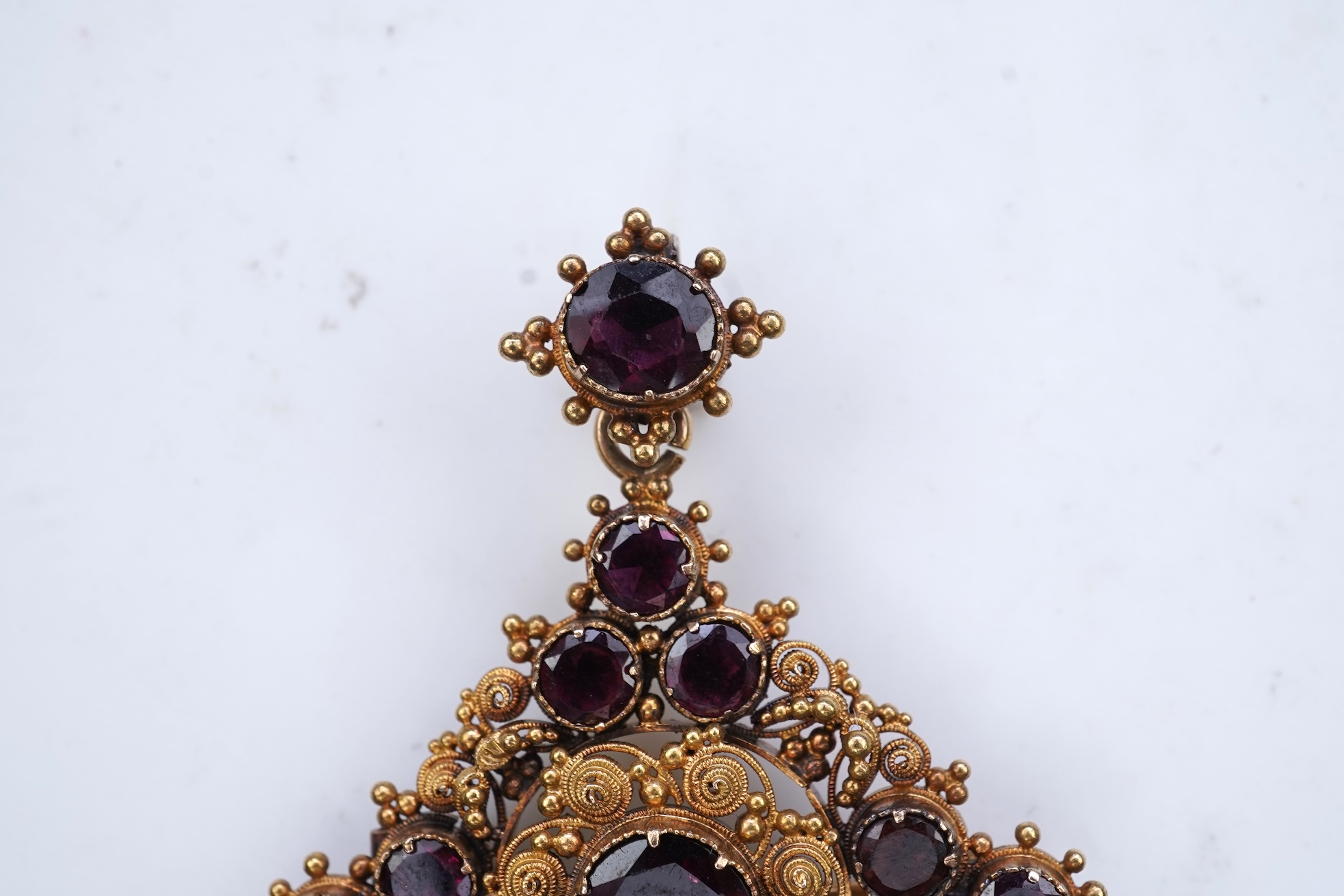 A late Georgian garnet pendant/brooch, 1830s